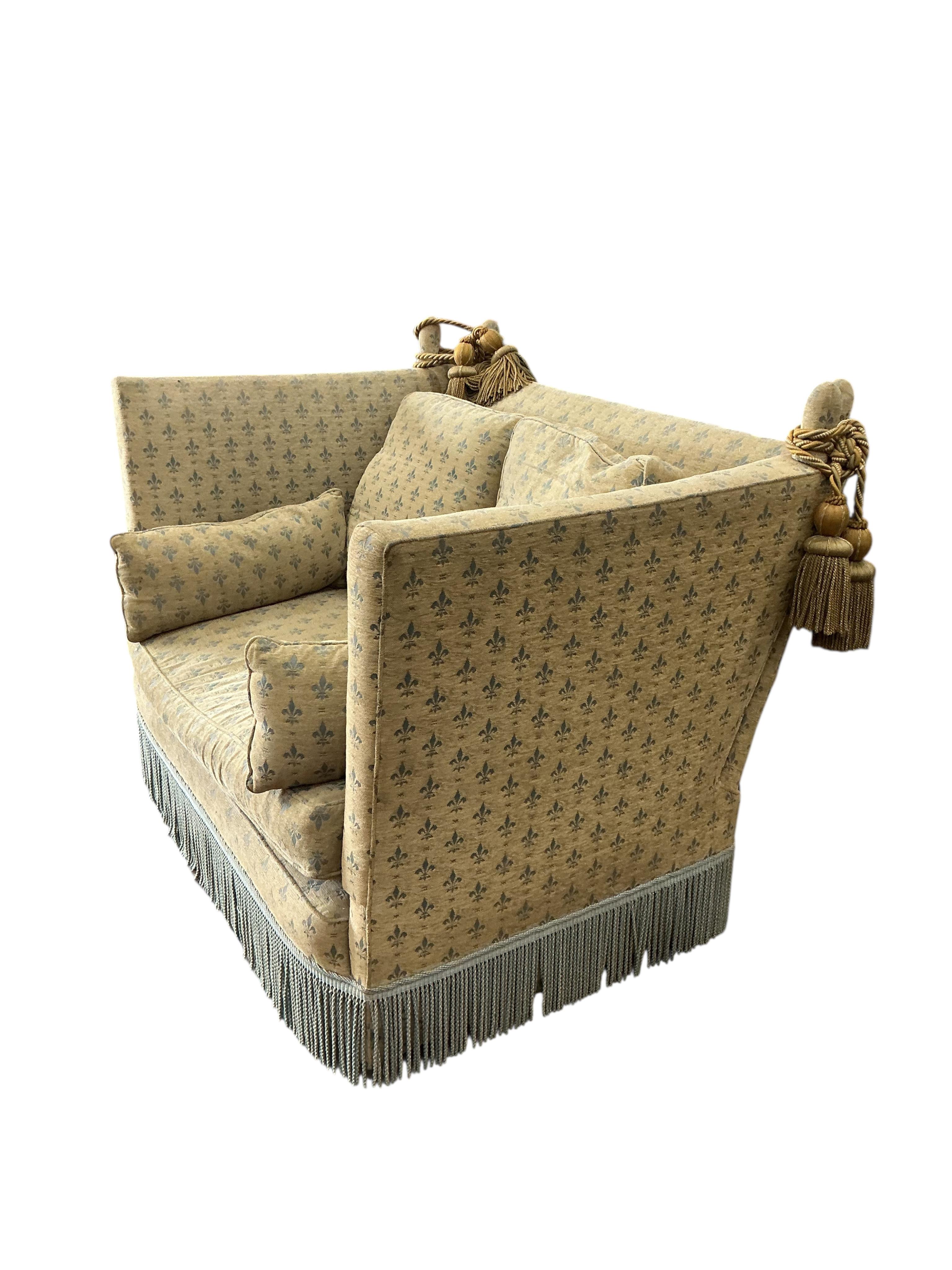 A small Knole upholstered settee, width 144cm, depth 90cm, height 100cm